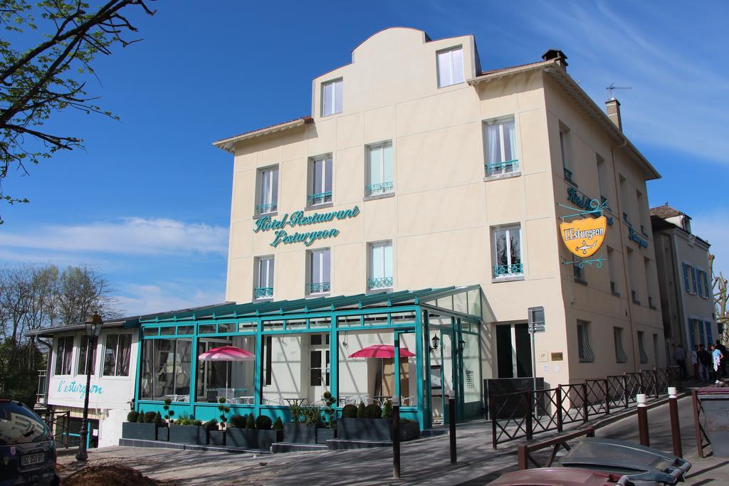 Hotel L'Esturgeon พัวส์ซี ภายนอก รูปภาพ